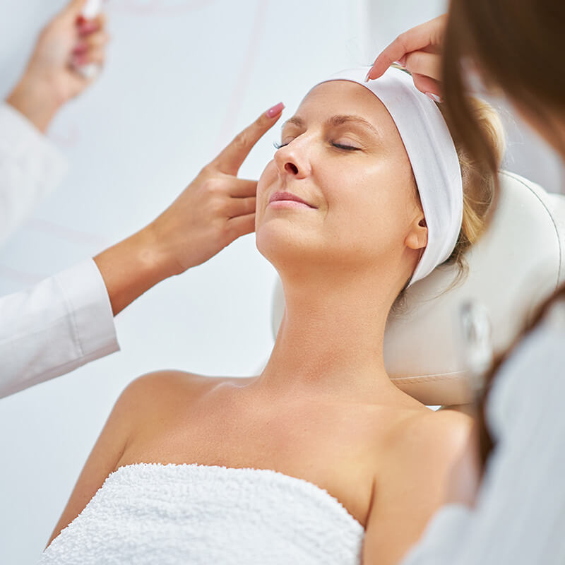 Woman getting injections done