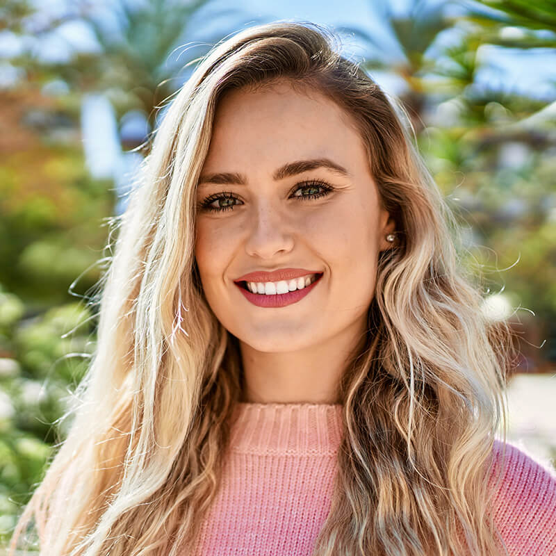 Beautiful woman outside smiling