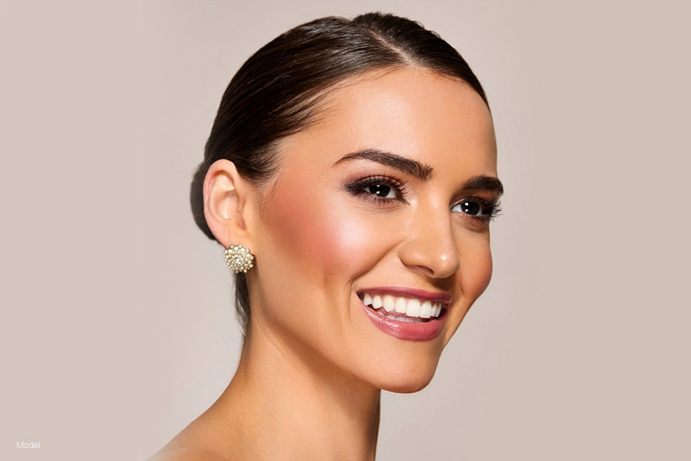 Mature smiling woman with high cheek bones 